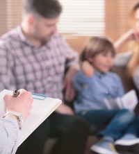 Couple and child sitting together during Family Counseling in Peoria IL