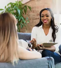 A counselor in session with their cleint
